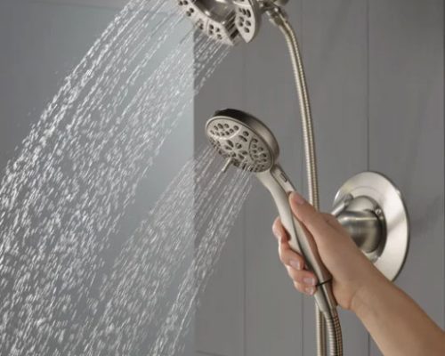 Shower head with detachable center